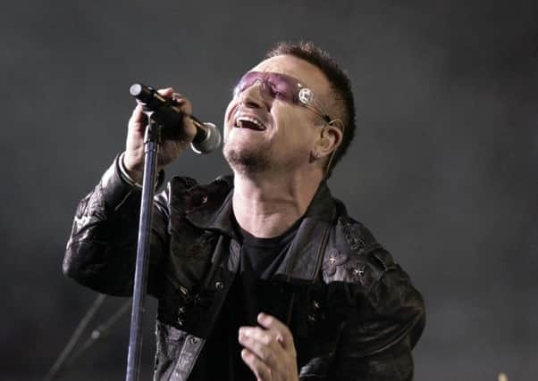 File photo dated 14/08/09 of Bono of U2, who were forced to postpone the next leg of their world tour after Bono injured his back. PRESS ASSOCIATION Photo. Issue date: Friday May 21, 2010. The singer underwent emergency surgery in Germany after suffering an injury while preparing for the upcoming shows in the US. See PA story SHOWBIZ Bono. Photo credit should read: Yui Mok/PA Wire