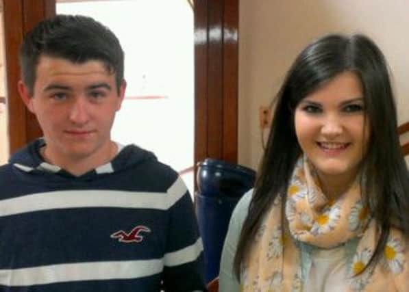 Ross Wallace and Megan McMichael celebrate their successful GCSE results at Larne High School.  INLT 35-675-CON