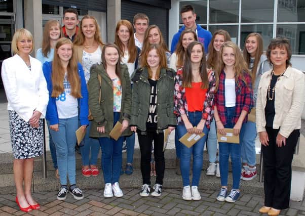 Students from Cambridge House Grammar School who received excellent results in their GCSE exams are pictured with Mrs. E. Lutton (Principal) and Mrs. C. McClurg (Senior teacher). INBT35-207AC