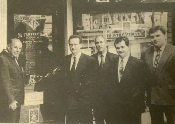 Retired Londonderry solicitor, Mr Claude Wilton, cut the tape at the official opening of the new First National Building Society agency at McCartney and Co. Solicitors, Castle Gate, in 1993.
Pictured, with Mr Wilton (on left) at the opening are: Gregory McCartney, Des Foley, Brian McCormick and Kevin Casey.