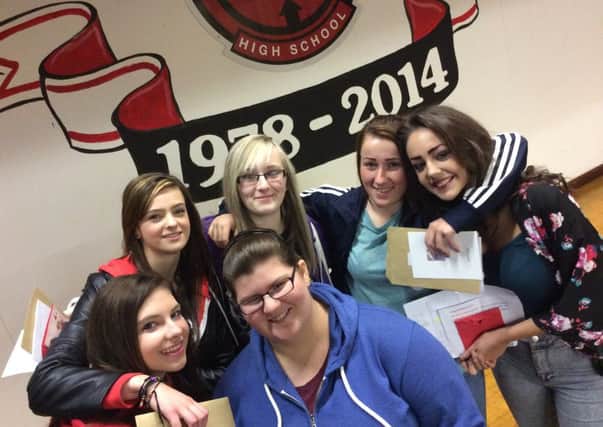 Balllee High School pupils celebrate their results.
