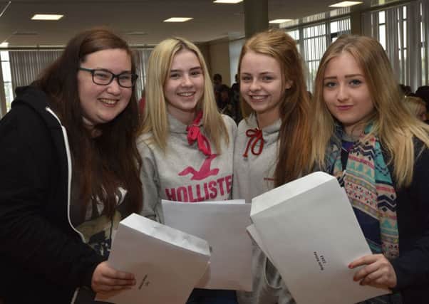 Pictured after collecting their GCSE results at Lisneal College were, from left, Melissa Hamilton, Shannon Nutt, Shannon Peart and Kelsey Boyle. INLS3414-111KM