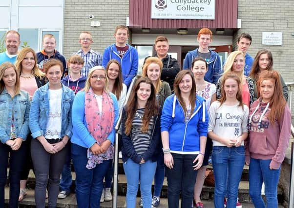 Students of Cullybackey College who achieved excellent grades in their GCSE's. Included is David Donaldson, principal. INBT 35-813H