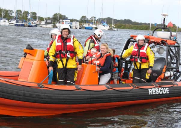 Out for a spin on one of the boats during the Lough Neagh Rescue Service fun day.