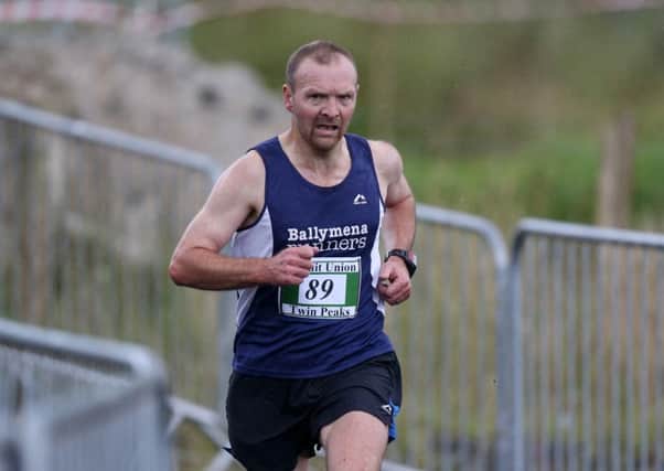 Alex Brennan of Ballymena Runners comes home to win the Twin Peaks race at Glenravel Festival. INBT 35-170CS