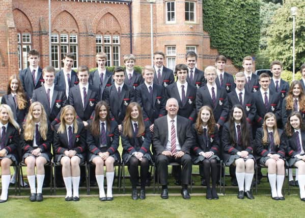 Lurgan College principal Mr Trevor Robinson with the top performers at the school; in GSCE results released last week.