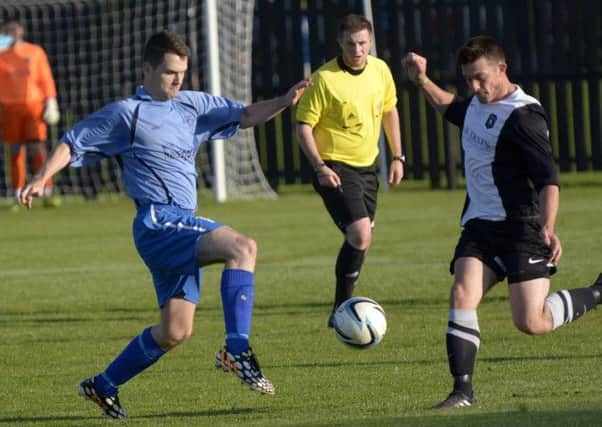 Action from Rangers' derby defeat to Dromara last week. Pic: Edward Byrne Photography INBL1434-203EB