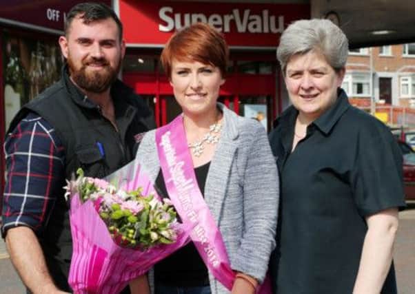 Tina Steenson

, WITH Julie Gregg and Jamie Poole of SuperValu Dromore