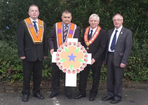 City Grand Master, James Hetheringonton, second right, with fellow officers, from left, Bro Stephen Burns, Bro Colin Campbell and Bro George Hunter.