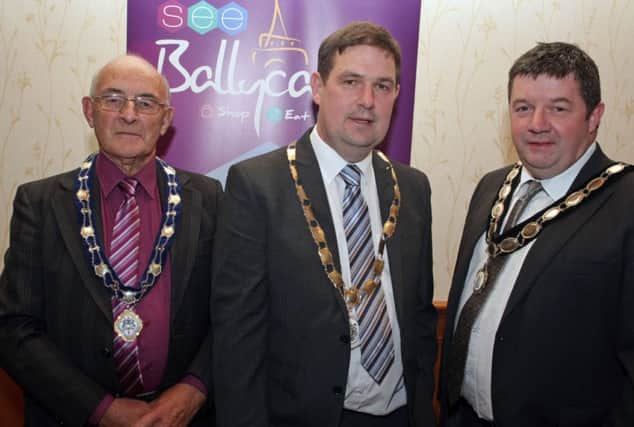 CHAIN LINK. Pictured at a pre- Lammas Fair dinner on Sunday night at the Marine Hotel along with Moyle Chairman, Cllr Donal Cunningham (centre) are Deputy Mayor of Ballymoney, Alderman Harry Connolly and President of Ballycastle Chamber of Commerce, Paul Cochrane.INBM35-14 062SC.