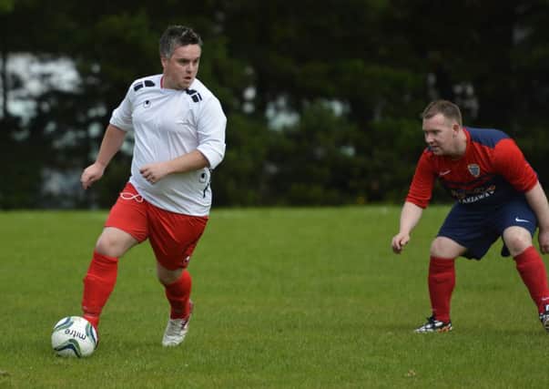 Mark McKittrick pictured on the ball for Irish Street during Saturday's match against Caw. INLS3414-149KM