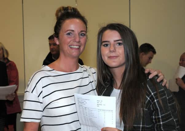 Emma Sugden and her mum, Amanda were delighted with Emma's A*, A and 4 B grades.  INCT 204-AM