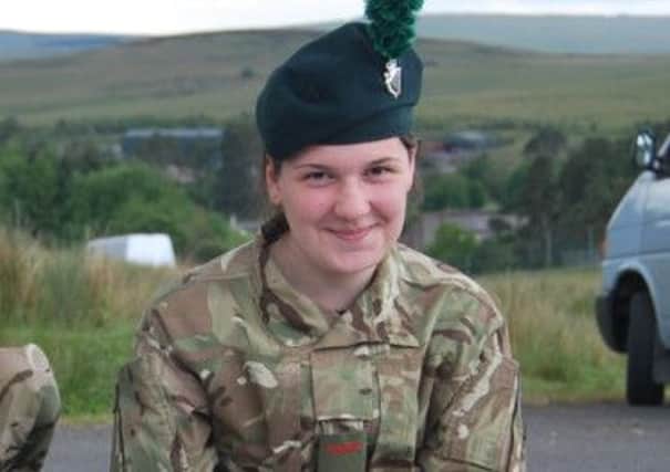 LCpl Chloe Campbell gets to grips with map reading,