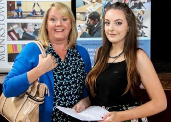 Aimee Kerr and her proud mum Joann. Amiee got  2 A*s,  2 As, 4 Bs and 1 C in her GCSE results. INNT 34-511-SO