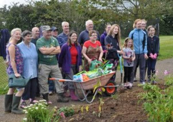 Volunteers who planted flowers at the Fair Hill, Ballycarry, on Saturday. INLT 35-646-CON