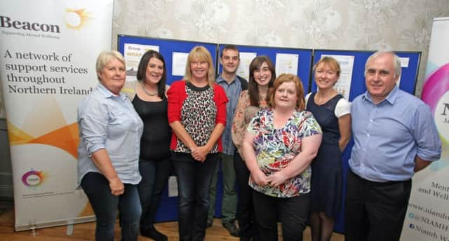 ON SHOW. Pictured at the N.Ireland Mental Health Showcase at the Lodge Hotel on Thursday are members from the North-East Beacon Community Day Support Team and members.CR34-104SC.