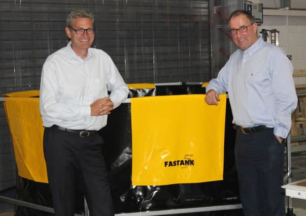 Seamus Connolly, Managing Director of Fast Engineering, pictured at the company's Antrim manufacturing  facility with  Gosta Tyrefors, President of Gadelius Industry K.K, Japan.