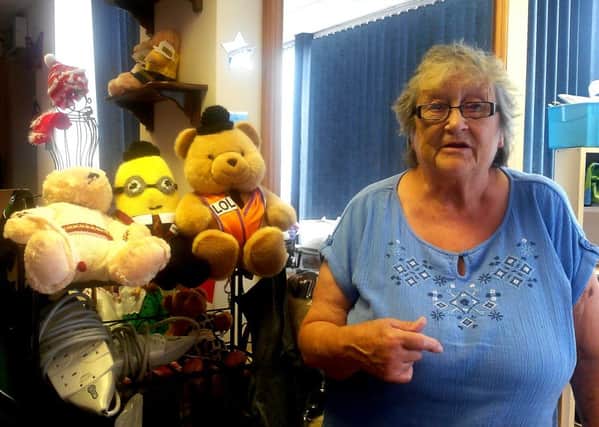 Gretta Campbell with some of her soft toy creations.