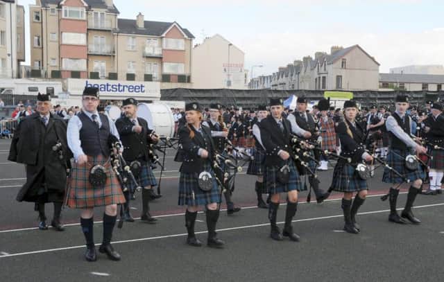 Topp Star of the North Pipe Band with Pipe Major Alan Glenholmes pictured during the march past at the North West Pipe Band Championships at Portrush on Saturday 23rd August.