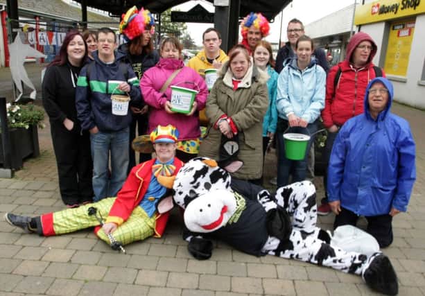 COW ABOUT THAT! Pictured are members of Can Can Recycling, who held a Jail 'n Bail to raise some funds on Friday at Castlecroft. Also included dressed up as a 'cow' is boss Linda McKendry.INBM36-14 009SC.