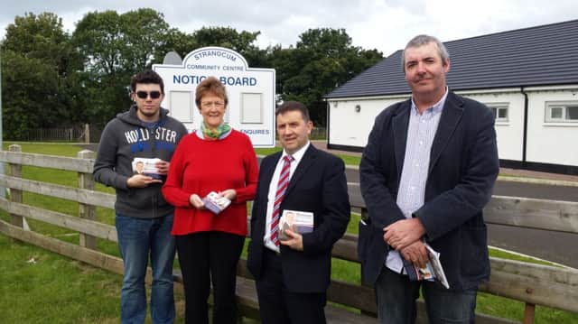 UUP Councillor Joan Baird, Robin Swann MLA, Derek Torrens and Chris Millar, both North Antrim UUP Members outside Stranocum Community Centre where the UUP has opened its fifth constituency surgery. INBM36-14S