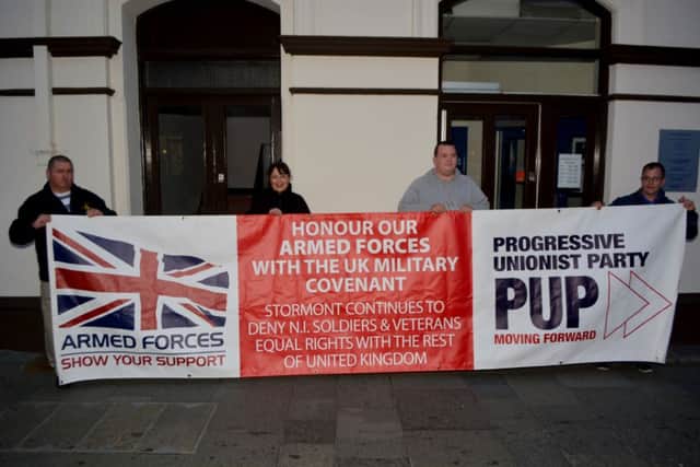 Members of the PUP and 'Ulster's Forgotten Military Veterans' stage an all-night vigil outside the Housing Executive office on Carrickfergus High Street to raise awareness of issues facing ex-service personnel in Northern Ireland. INCT 36-121-GR