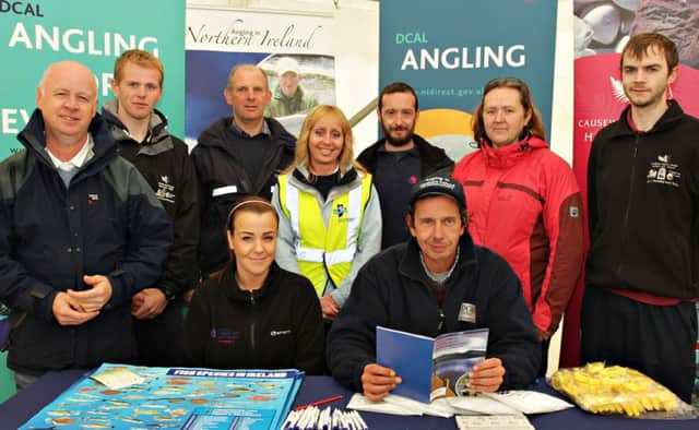 SOMETHING FISHY IS GOING GO. Pictured on Saturday at the DCAL Go Fishing event at Altnahinch Dam are seated Tracy Adams and Teddy Roughan (both from DCAL), standing from left, Martin Conlon, (DCAL), Andrew Bratten, (Causeway Coast and Glens Heritage Trust), Maynard Cousley  (NI Water), Sonia Crawford, Ballymoney Counci Countryside Access Officer)l, Stewart Montgomery  (DCAL), Rachel Bain,( Bio Diversity Officer Ballymoney Council) and Tiernan McCarry, (Causeway Coast and Glens Heritage Trust).INBM36-14 004SC.