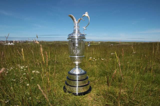 The Claret Jug during a photocall to announce that Royal Portrush will re-join the rota for hosting the Open Championship, at The Royal Portrush Course, Portrush. PRESS ASSOCIATION Photo. Picture date: Monday June 16, 2014. The Royal Portrush course in Northern Ireland has been invited to join the rota to host future Open Championships. The famous seaside links on the Causeway coast last staged the Open in 1951 - the only time it has been played outside England and Scotland. The major could return to Portrush as early as 2019. See PA Story GOLF Portrush. Photo credit should read: Niall Carson/PA Wire.