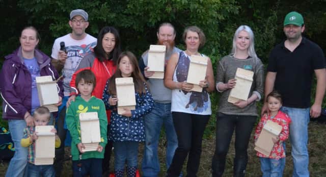 Participants with bat boxes made during International Bat Night at Bashfordsland Wood on Saturday. INCT 36-750-CON