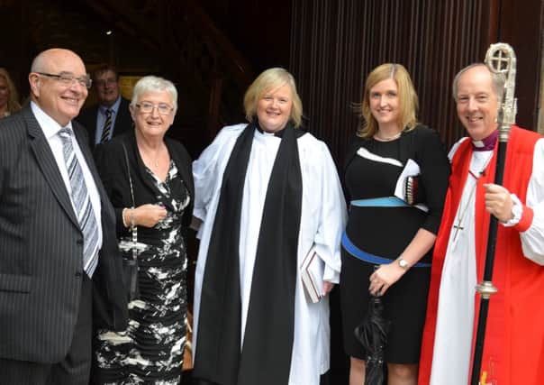 Ordination: Newly ordainted Rev Catherine Simpson pictured with Rishop of Derry and Raphoe, Ken Good (right) and, from left: Catherine's father and mother, Samuel and Vida Simpson and her sister, Sarah Simpson.