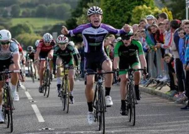 Jake Gray of Cookstown Cycling Team leads the chasing group over the line to claim one of his three National Titles