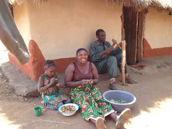 Mainess Munamalambo and her husband Shadreck Hanga'ndo with their youngest child Sandra.