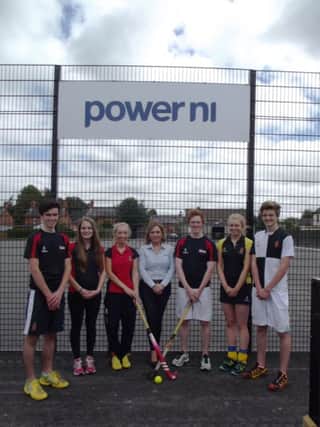 Senior Hockey students from Wallace High School with Power NI representative Aine Bloomer (centre) at the official launch of the school's new 3G sports pitch. Power NI provided investment for the pitch which will give pupils and staff all-year-round sporting facilities. Pictured is Aine Bloomer, Power NI (centre) with from left, Wallace High pupils, Mark McNeills, Alex Patterson, Kerry Beckett, Ryan Getty, Nicola McIlroy and Thomas McRoberts.