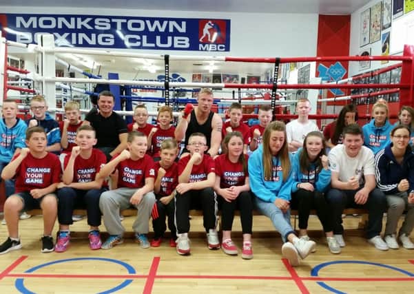 Former England Cricket captain Andrew 'Freddie' Flintoff was back in Monkstown Amateur Boxing Club at the weekend filming for a new television series. He's pictured with some of the young people from the club's Kid Gloves programme.
