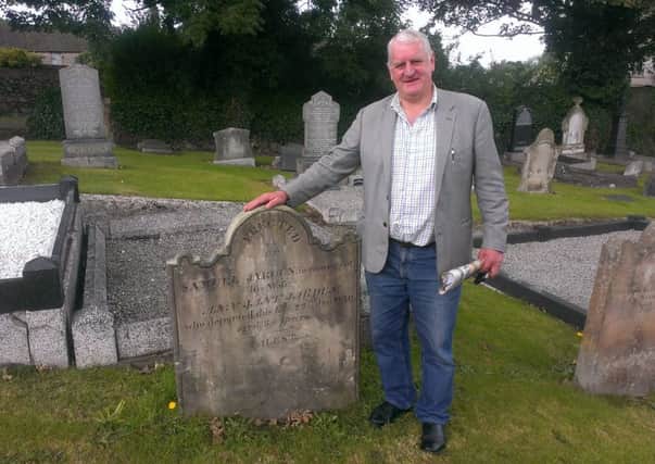 Andy Jarden at the grave of what is very likely to be one of his ancestors.