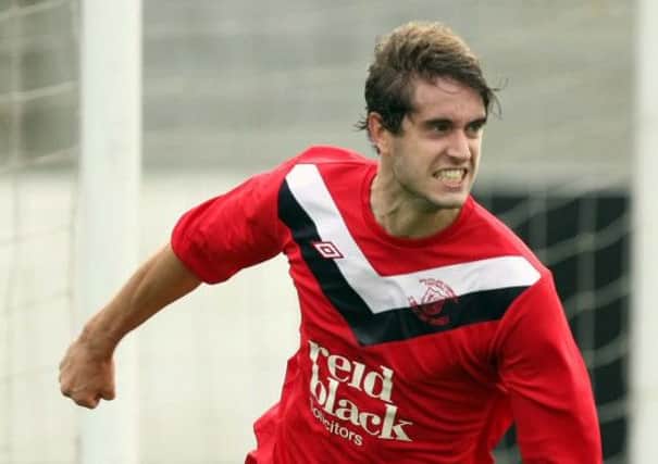 Comrades striker Chris Trussell is one of four Dixon Park men in the NI Regions' Cup squad.