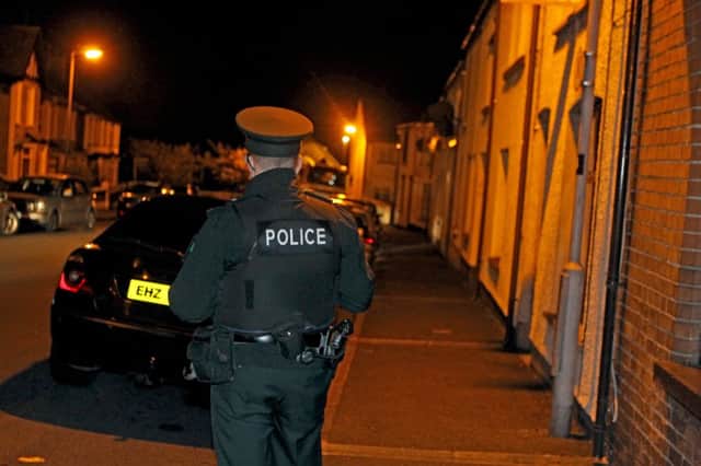 Police at the scene of a shooting on Henry Street Ballymoney at approx 2330 hrs a number of men entered a house and fired a number of shots. The male occupant was not injured but left shaken. Police have appealed for information from  the public and have asked anyone with any information to contact dectectives in Coleraine on 101.PICTURE STEVEN MCAULEY. INBM37-14 KMA
