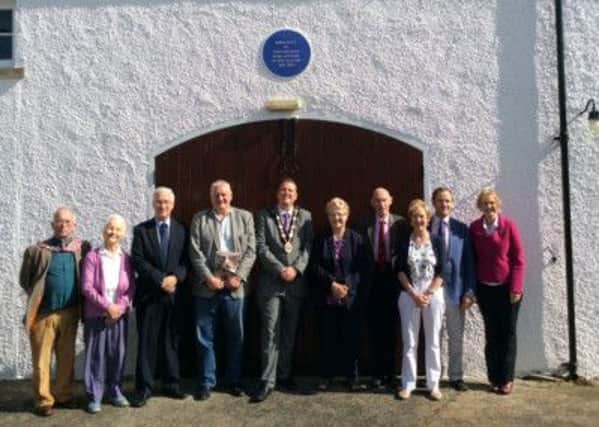 Andy Jarden (fourth left) at Ballance House with (from left) David Twigg, Mary Twigg, Adrian Donaldson, Lisburn Mayor Councillor Andrew Ewing, Councillor Margaret Tolerton, Fullerton Jelly, Freddie Hall, Yvonne Hall and Maureen Jelly. Andy presented David Twigg with copy of the Wanganui Chronicle containing feature on John Ballance and Ballance House.