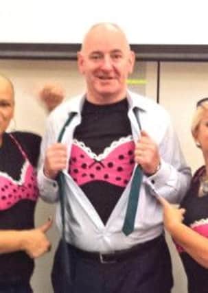 Foyle MP Mark Durkan supporting the Bosom Buddies campaign to raise awareness about the early detection of breast cancer.