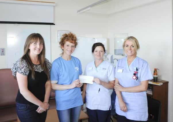 Pictured from left to right at the cheque presentation: Coleen Brown, Rhonda Boyd, Western Trust Play Specialist Cathy Grady and Western Trust Staff Nurse Caroline OKane.