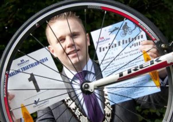 Mayor of Newtownabbey Alderman Thomas Hogg launches the Stena Line Triathlon.