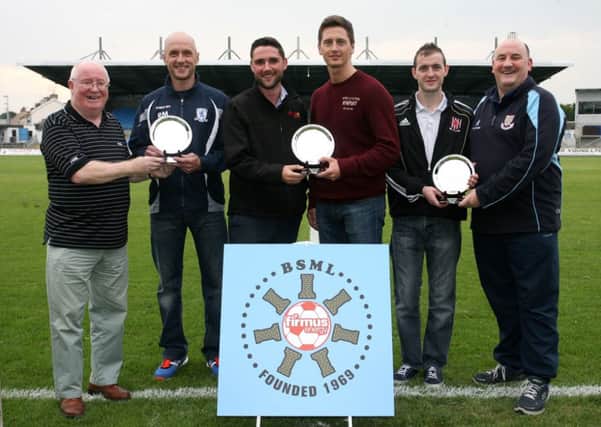 David Fusco of Firmus Energy is pictured presenting Johnny Rice of Clough Rangers with the Ballymena SML Division 1 player of the month award, as Robert Crawford (Riverdale FC) receives the Division 2 player of the month award from Brian Montgomery, and Kieran O'Boyle (Wakehurst Start) receives the Division 3 player of the month award from Davy King. INBT37-207AC