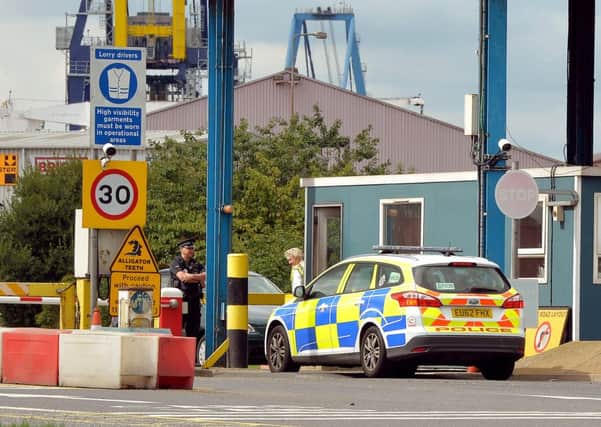 The main entrance to Tilbury Docks in Essex, as a third man has been charged in connection with the death of an Afghan immigrant.