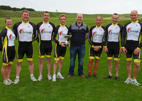 Ballycastle CC race team : Helena Dornan, Jimmy Young, Vinny Mort, Gary Maybin, Peter Dallat, Shane Mc Neill, Tadhg Sands, ( Dlecan Mc Caughan missing from picture ). Pictured with sponsor Pearse Mc Henry of Solar Power NI.INBM37-14S
