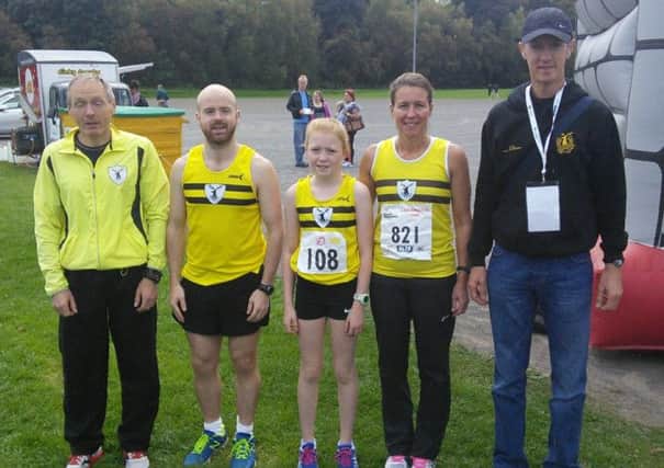 Fit N Running athletes Mark McKinstry, James Wallace, Paula Wallace, Rebecca Wallace and Coach Gregory Walsh at Laganside on Sunday.