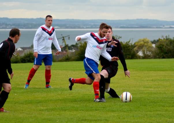 Action from Whitehead Rangers' 3-1 Canada Trophy win over local rivals FC Larne last weekend.