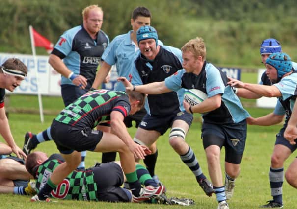 PUSH OFF. Action from Ballymoney 1sts against Clogher Valley on Saturday.INBM36-14 033SC.