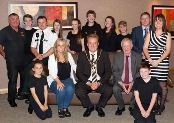 Young people from MADS with (back row l-r) Ciaran Corr MADS, Constable Clarke PSNI, Ian Coulter Youth Justice Agency, Lynette Cooke PCSP (Front row l-r) Orlaigh McKenna Nexus, Mayor of Craigavon Councillor Colin McCusker & Gerry McIlroy Chair of Brownlow Festival Committee.