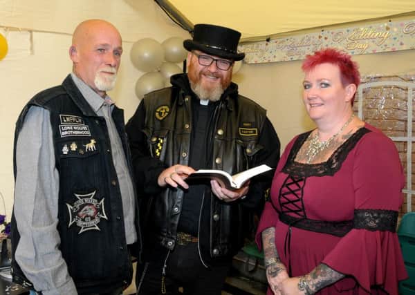 Tribe of Judah Pastor, Reverand Gary Millar conducts the wedding of Brett "Hobo" Allan and Ann Marie Kinney at the Lone Wolves Brotherhood Motorcyle rally held on the grounds of Larne Rugby Club, the annual rally is raising funds for, PIP,S and NI Eating Disorders  INLT 37-212-AM