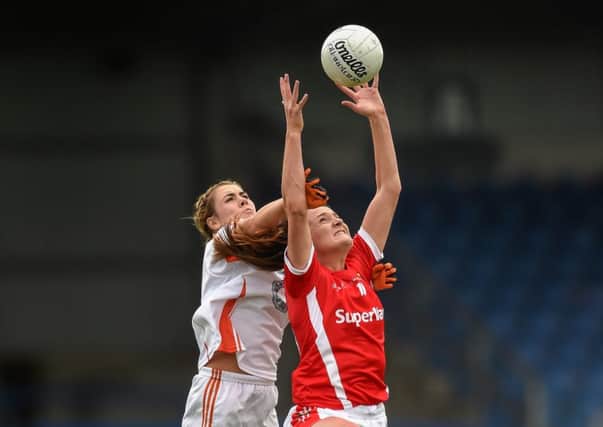 Niamh Henderson (left) of Clann Eireann on show for Armagh ladies last weekend in Longford. Pic by Sporsfile.INLM38-101